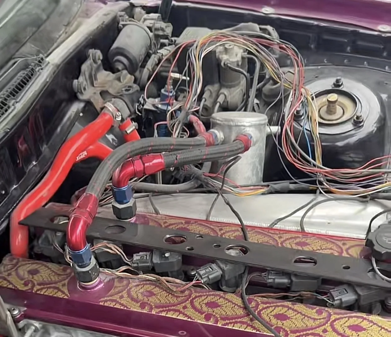 Modified wiring in Toyota Supra engine bay